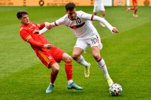 Vladimir Nikolov of Bulgaria U21 holds off the challenge from Jack Vale of Wales U21 during the UEFA European Under-21 Championship Qualifier Group E match between Wales U21 and Bulgaria U21 at Rodney Parade in Newport, Wales, UK on 29, March 2022. Credit: Duncan Thomas/Majestic Media.