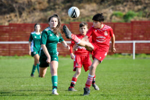 Action from the FAW Academy South Under 12 League game between Briton Ferry Llansawel Academy Under 12 and FAW Trust Girls Academy South Under 14 at the Old Road Ground in Briton Ferry, Wales, UK on 3 April 2022. Credit: Duncan Thomas/Majestic Media.